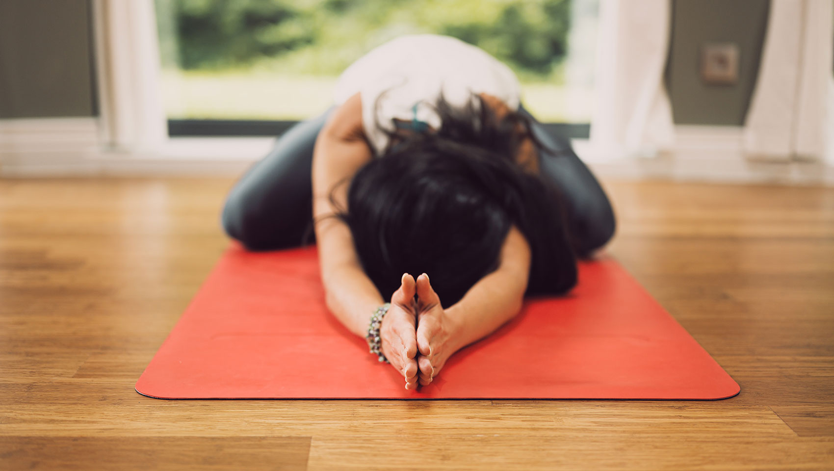 hwoman on yoga mat