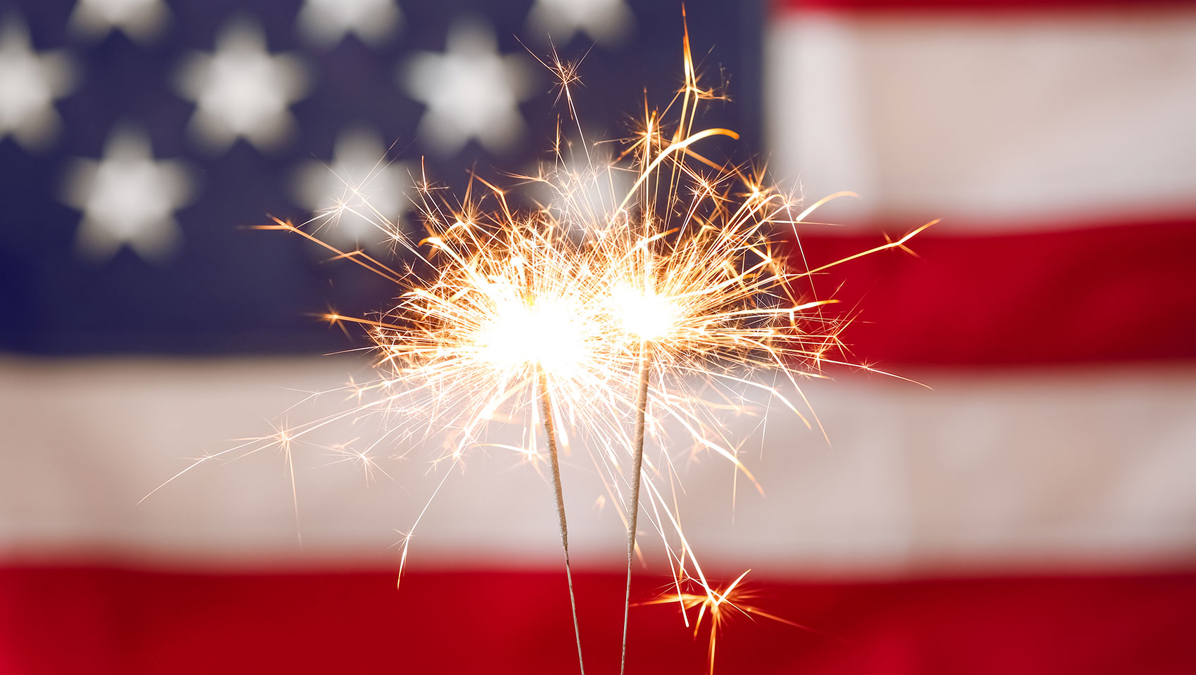 American Flag with Sparklers in front of it