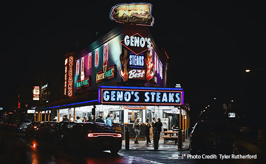 Geno’s Steaks restaurant at night